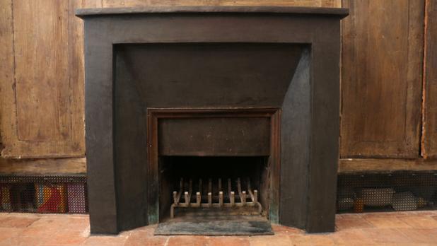 Cheminée rénovée grâce à l'enduit en béton ciré